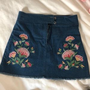 denim mini skit with embroidered flowers